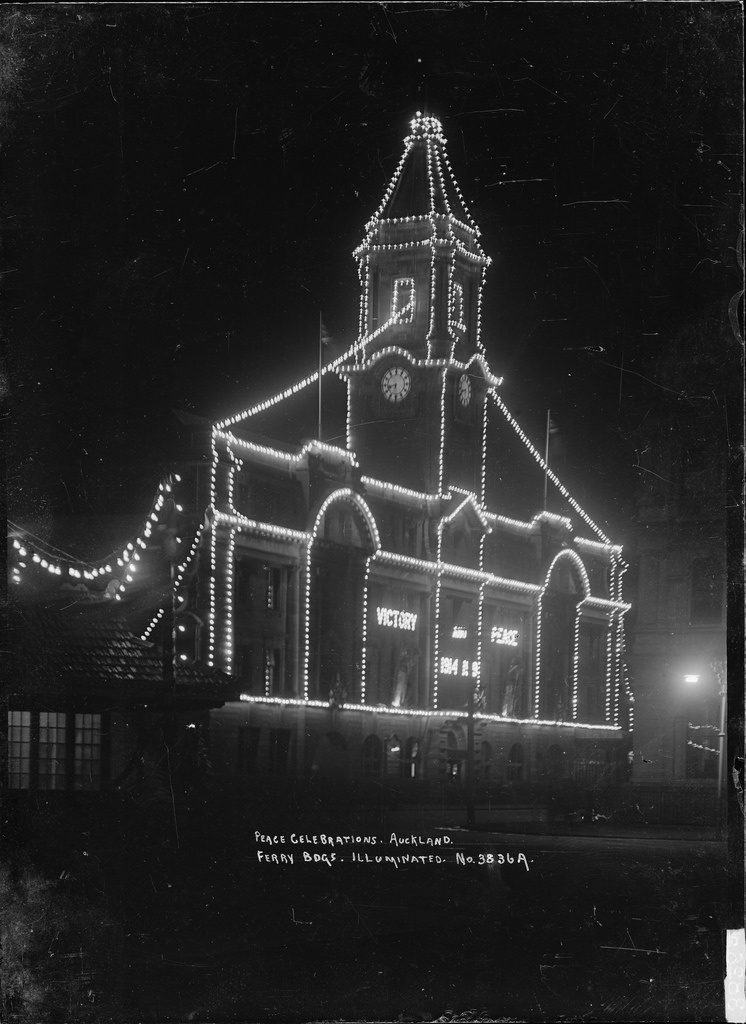 View of Auckland Ferry Building taken at night to show the Peace celebration lightings