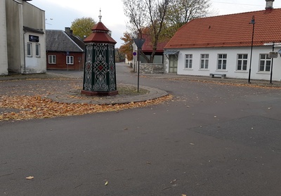 An old town yard with metal coating walls in Kingissepa. rephoto