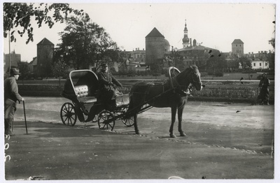 Knightman with a van on the way to the Rannamäe, in the background of the Tower Square.  duplicate photo