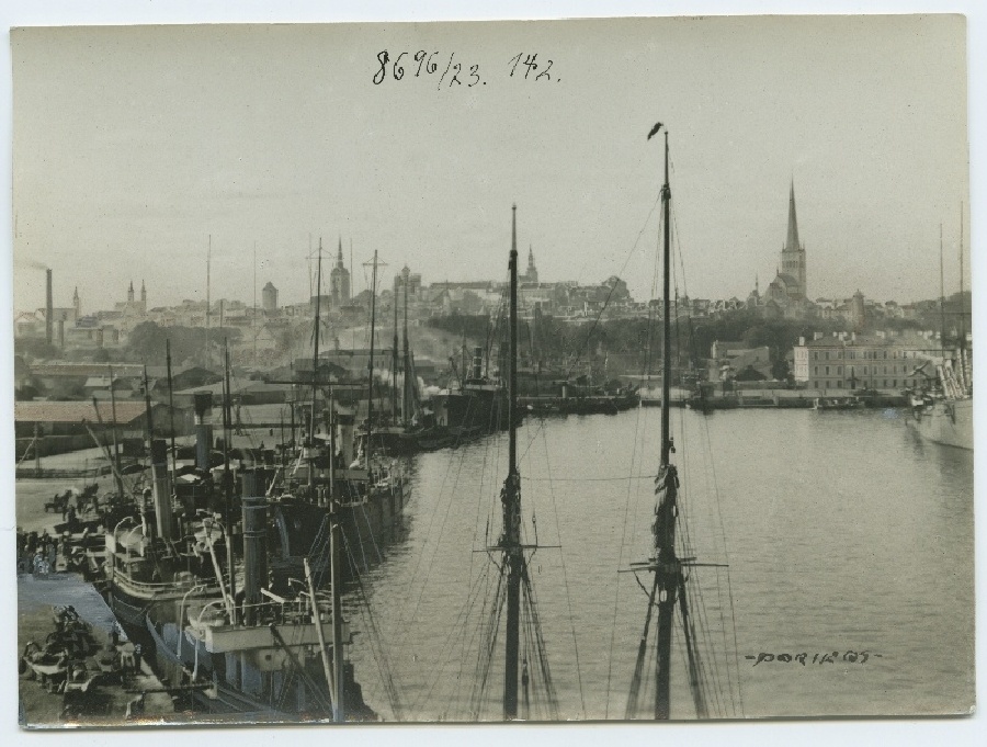 J.han, the port of Tallinn, behind the city's siluette.