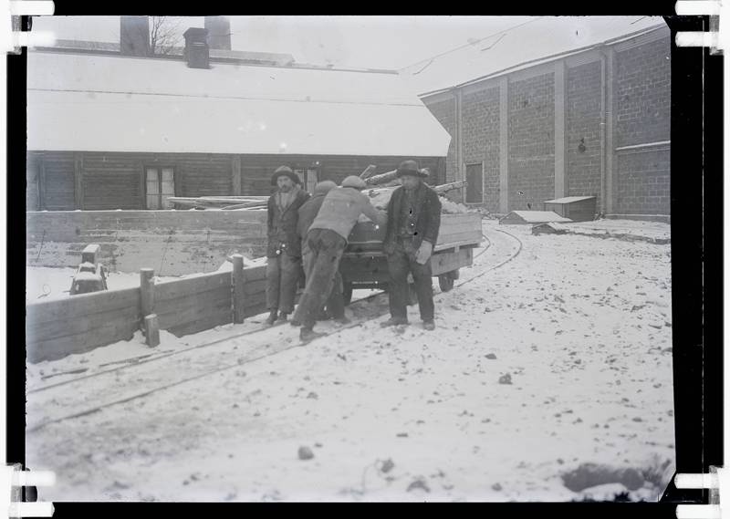 Glass negative. As Järvakandi Glass Factory. Outdoor view of the courtyard. Work with raw materials