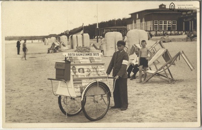 Tallinn. Newspaper boy at the beach of Pirita  duplicate photo