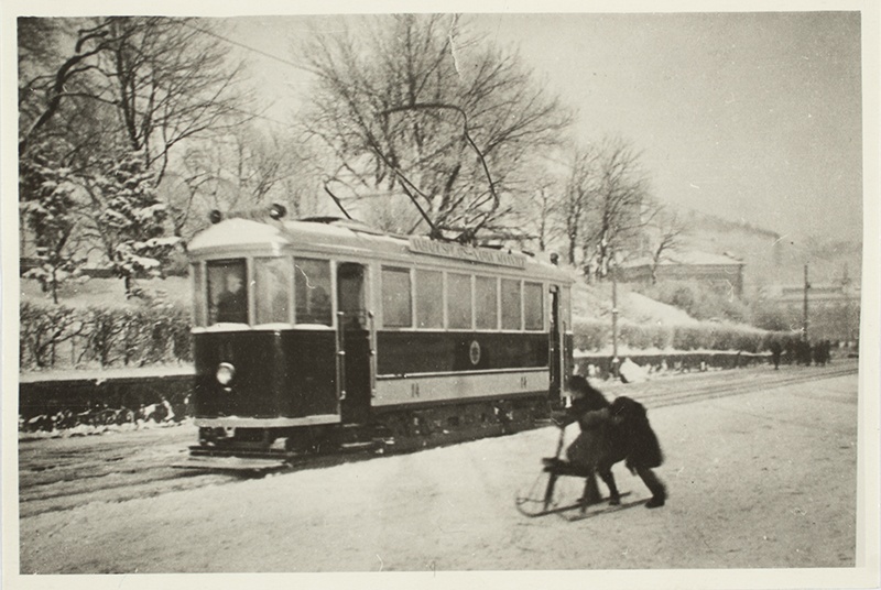 Fashionable and old-fashioned mode of movement - electric tram and pusher. Tallinn