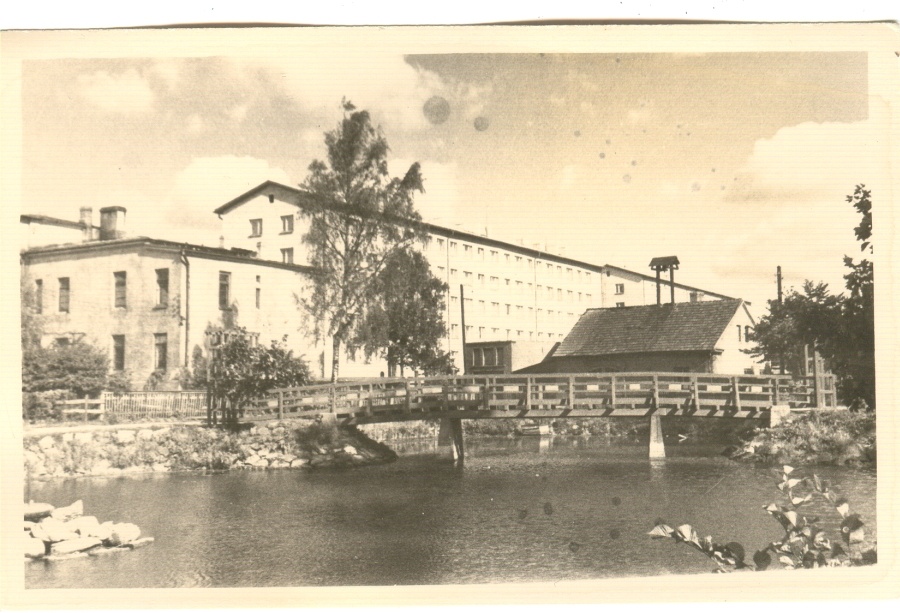 View of apartments in Tartu on Tiigi Street and fire fighter clockboard