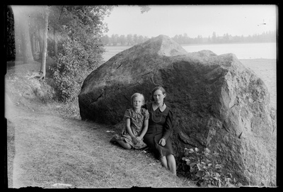 Women's clothing - girls at Kalevipoja stone near Saadjärvi ?  duplicate photo