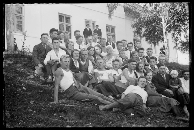 Clothing for men, women and children - group picture in nature