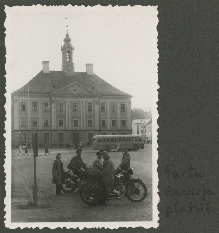 Passengers on motorcycles on Tartu Raekoja Square