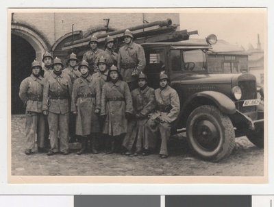 Team III security team in front of the tank car in 1941.  similar photo
