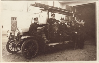 Members of team II on fire car in 1937.  duplicate photo