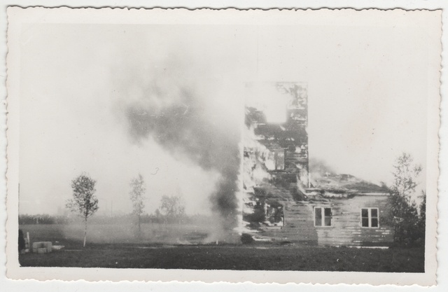 Urban air defence and fire extinguishing maneuver for the hypodrom. Building burning in 1937.