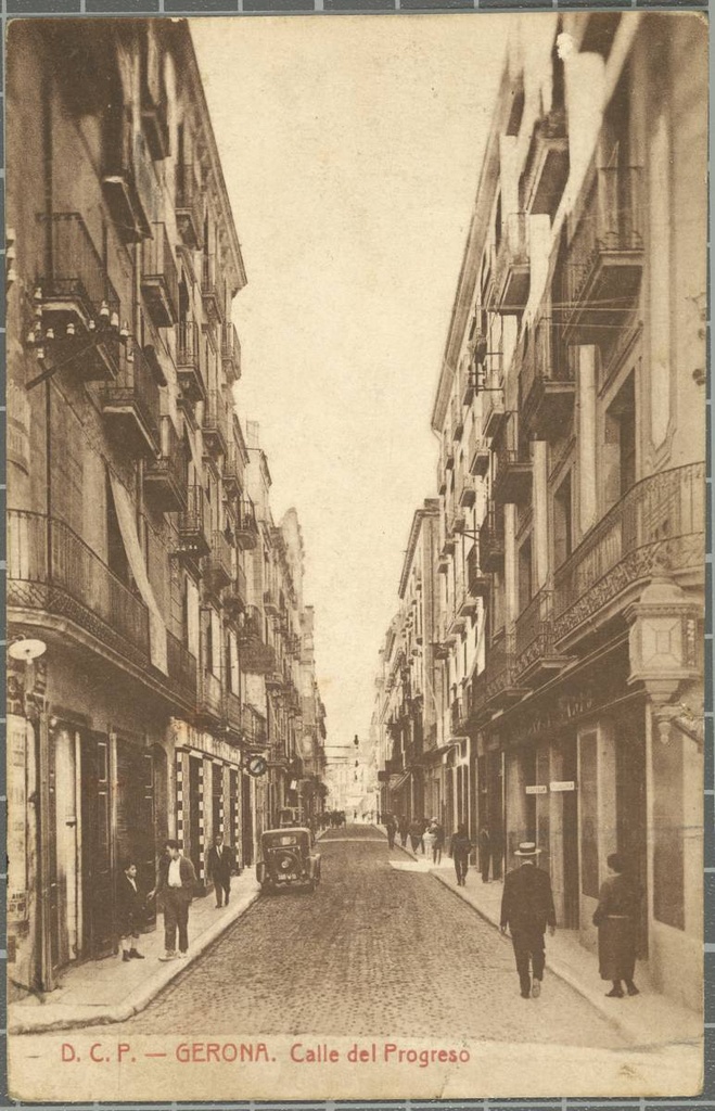 D.C.P.-Gerona. Calle del Progreso - View of New Street from Stone Bridge. On the left, the Peninsular Hotel