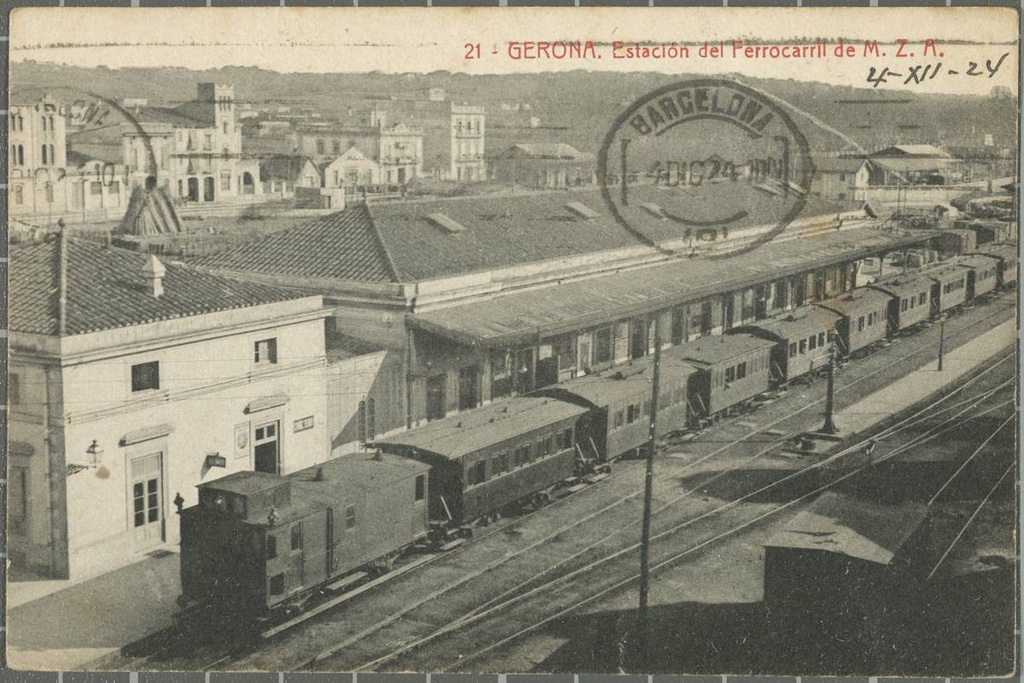 21 -Gerona. Railway station of M.Z.A. - View from a high point of the station Railway Girona. In the background, the road to Barcelona.