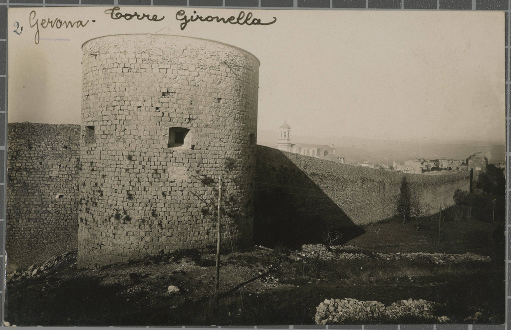 2. Gerona - Gironella Tower - The tower of Santo Domingo and the section of the wall of Santo Domingo that connects it with the Tower of the Telegraph or the Tailor. In the background stands the Cathedral of Girona.