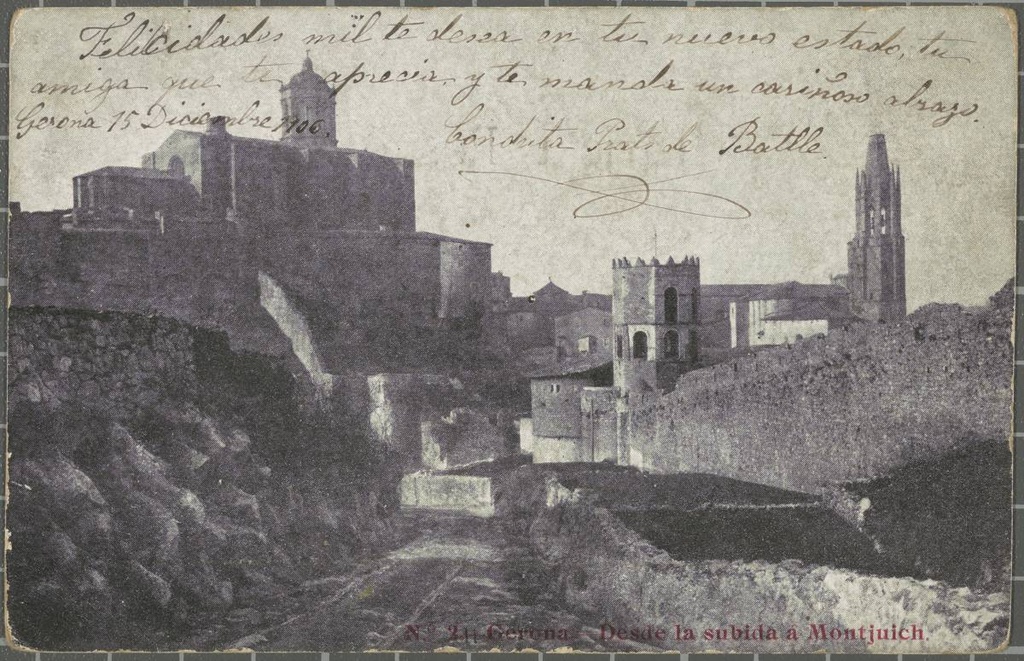 No. 2.-Gerona.-From the Subida in Montjuich - View of the Old Quarter from the ascent to Montjuic First, a section of the wall of San Pedro de Galligants, with the church of the same name in the second place. In the background, the Cathedral of Girona and the bell church of Sant Feliu on the left. In the second term, the drum of San Daniel is observed in front of the San Pedro portal.