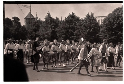 1950 singing festival, folk dancers and folk ball players.  similar photo