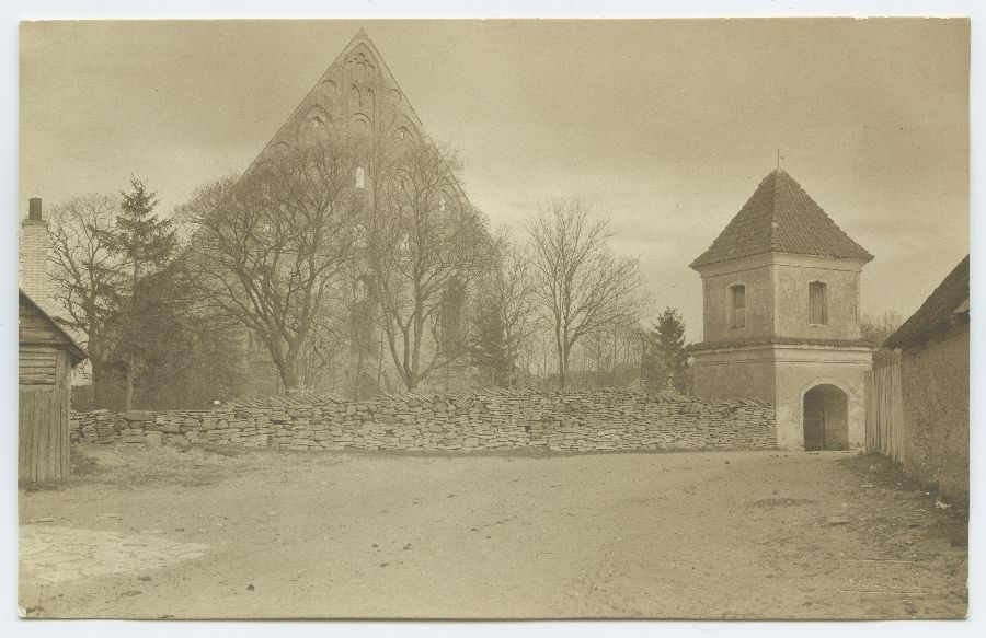 The ruins of the Pirita monastery in Tallinn with the cemetery clock from the west.