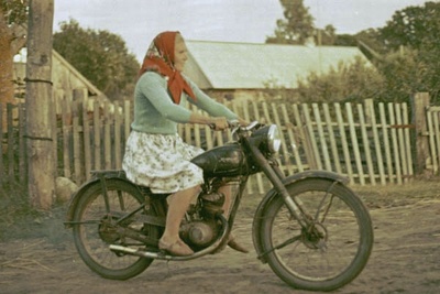 "Ruhnu loob". Naine mootorrattal.  similar photo