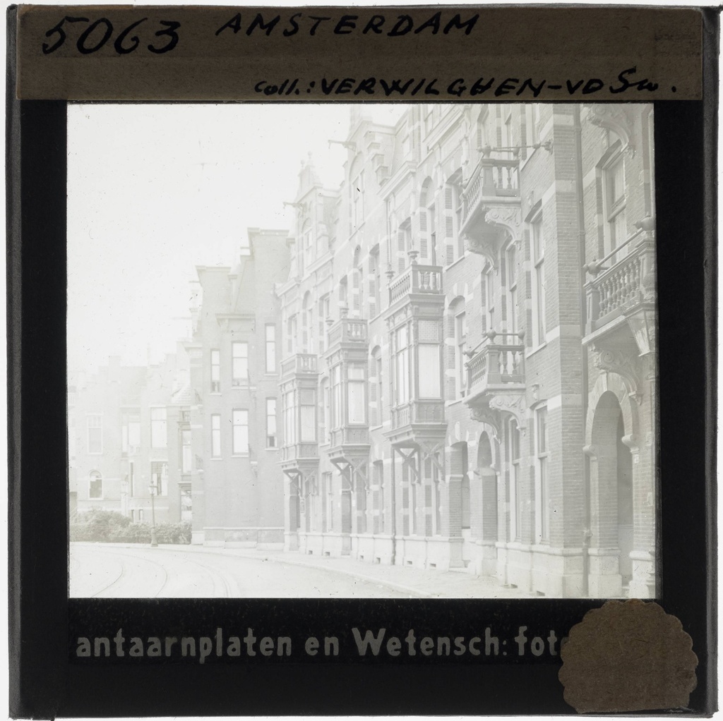 Amsterdam. Townhouses - KU Leuven. Glass slides landscape, architecture and design. Université de Louvain, between 1839 and 1939. Photographer unknown. Added information on slide. Current location: Netherlands, Amsterdam. EuroPhot. Art History. Period unknown. Architecture. Building. EuroPhot. Art history. Period unknown. Architecture. Building. EuroPhot. Social history. Period unknown. Architecture. Building. EuroPhot. Social history. Period unknown. Architecture. Building.