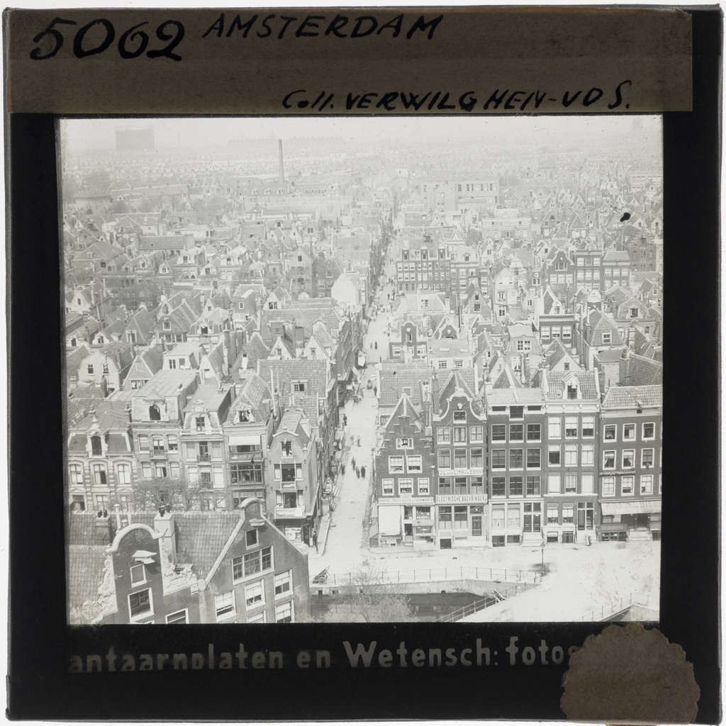 Amsterdam. Panorama - KU Leuven. Glass slides landscape, architecture and design. Université de Louvain, between 1839 and 1939. Photographer unknown. Added information on slide. Current location: Netherlands, Amsterdam. EuroPhot. Art History. Various periods. Architecture. City. EuroPhot. Art history. Various periods. Architecture. City. EuroPhot. Social history. Various periods. Architecture. City. EuroPhot. Social history. Various periods. Architecture. City.