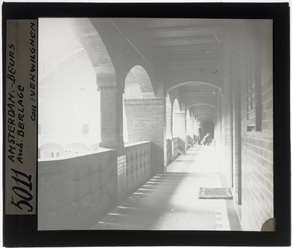 Amsterdam. Beurs van Berlage Interior: Corridor - KU Leuven. Glass slides landscape, architecture and design. Université de Louvain, between 1839 and 1939. Photographer unknown. Added information on slide. Current location: Netherlands, Amsterdam, Damrak and Beursplein. Current/Methods: Rationalism. Creation/Building: 1898-1903. EuroPhot. Art History. 19th century. Architecture. Building. EuroPhot. Art history. 19th century. Architecture. Building. EuroPhot. Social history. 19th century. Architecture. Building. EuroPhot. Social history. 19th century. Architecture. Building.