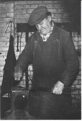 Taevaskoja kolhoosi sepikoda ja sepp  similar photo