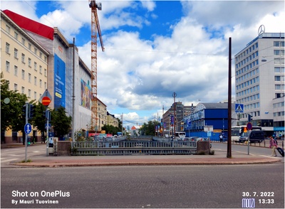 Näkymä Runeberginkadulta Pohjoisen ja Eteläisen Rautatiekadun suuntaan.  Vasemmalla Pohjoinen Rautatiekatu 23, 21.  Oikealla Fredrikinkatu 52. rephoto