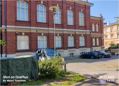 Suojeluskuntalaisia Korkeavuorenkatu 23:n takapihalla rephoto