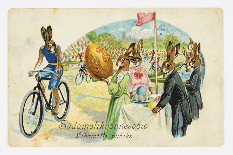 Lihavõttekaart jalgrattavõistlusel finišisse jõudnud jänesega ning tekstiga "Südamelik õnnesoov Lihavõtte pühiks"