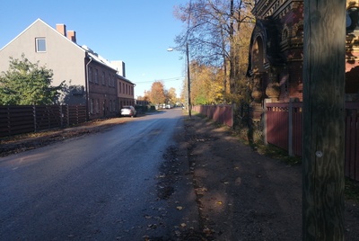 Tartu, Kalmistu Street. View from the cross street to the outskirts of the city. rephoto