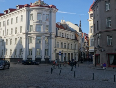 View of the building affected during the March bombing on the day following the attack on the corner of Vana-Post and Suur-Karja Street rephoto