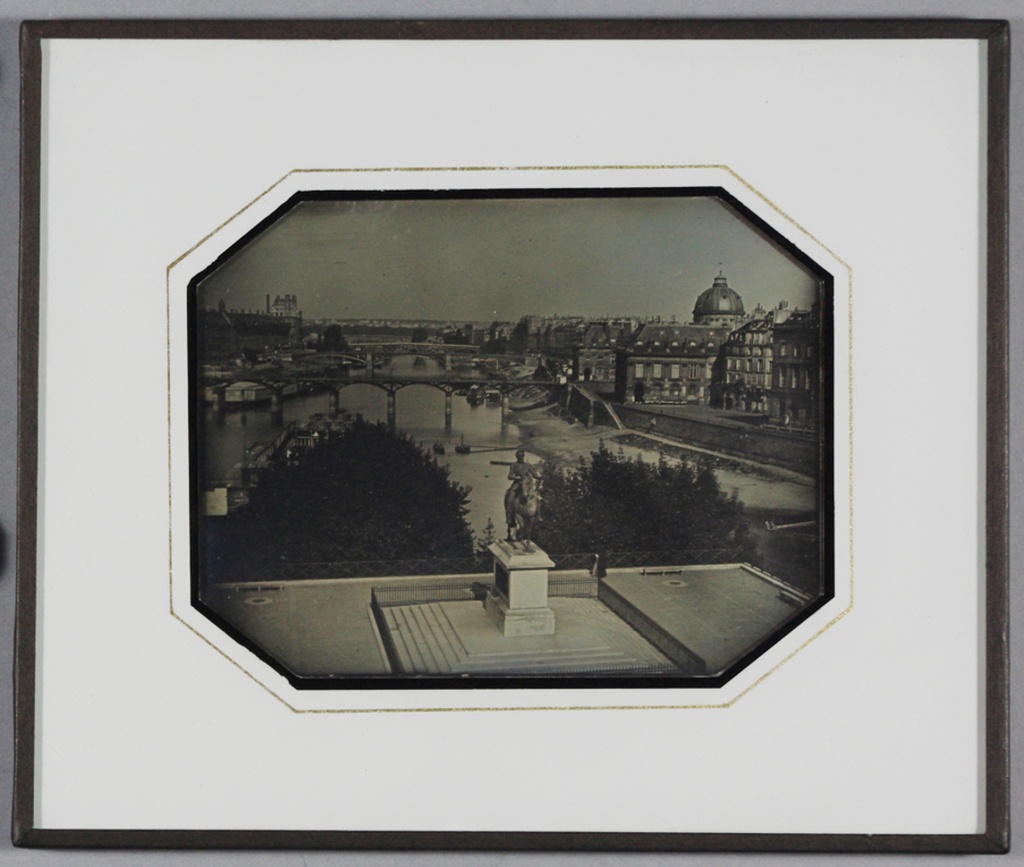 Notes say circa 1840.
possibly Lerebours.
Recently remounted in modern frame - View of Paris and the Seine with King Henri IV statue in its small square in foreground on the Ile de la Cite Island