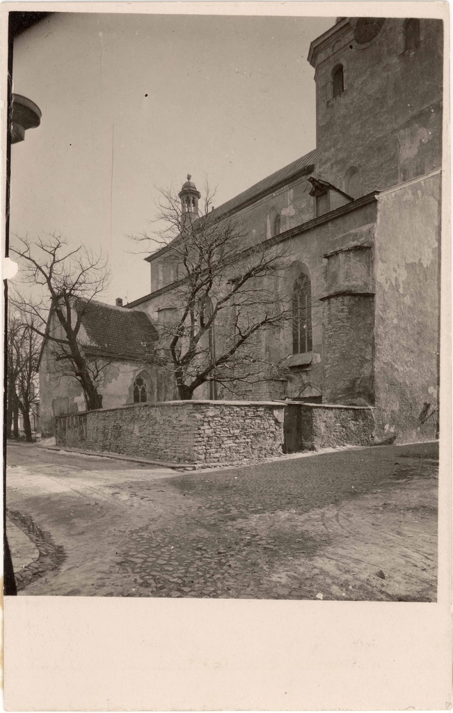 Toomkirik. Outdoor view from NW to northern façade and stone garden in the northeast corner of the church