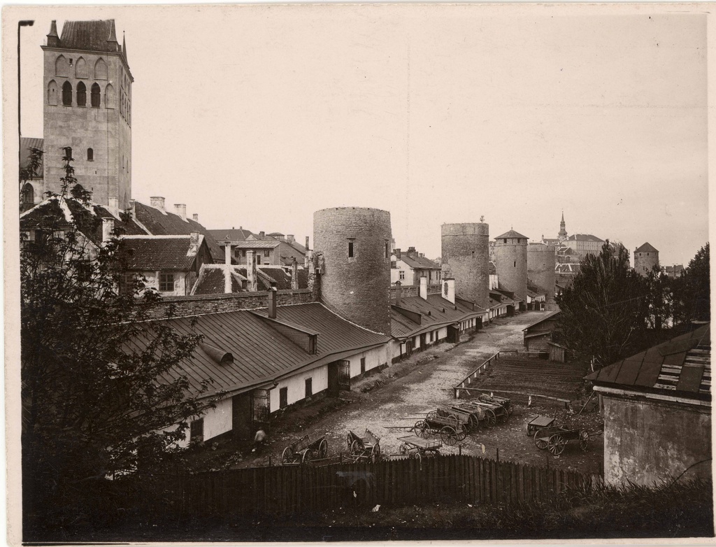 All-city. View of the n towers near the Laboratory Street. From the left: Oleviste Church, Grusbekeeback, Eppingi, Plate, Köismäe, Loewenschede towers. On the right side of the Stenbock house and Toomkirik Tower