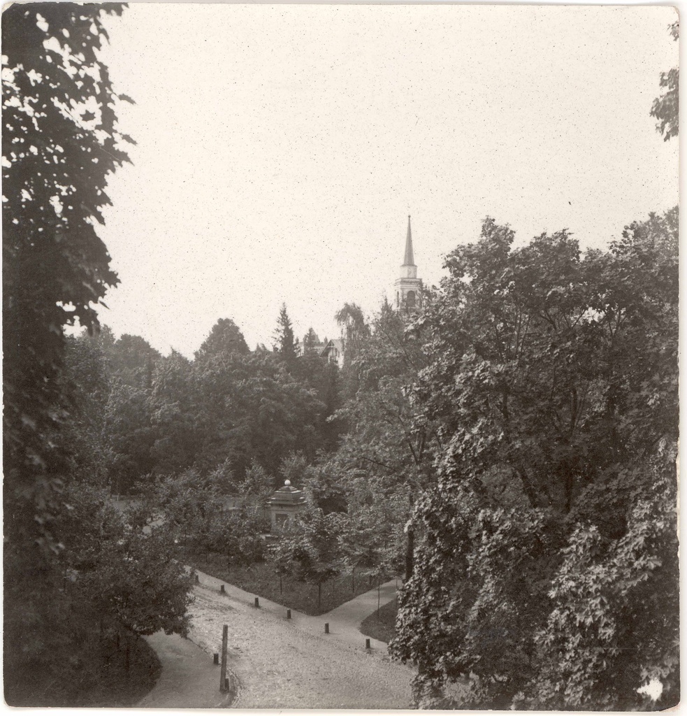 Vallikraavi tn view from the Kurad Bridge. The monument of the people. Back to the tower of the Mary Church (degraded)